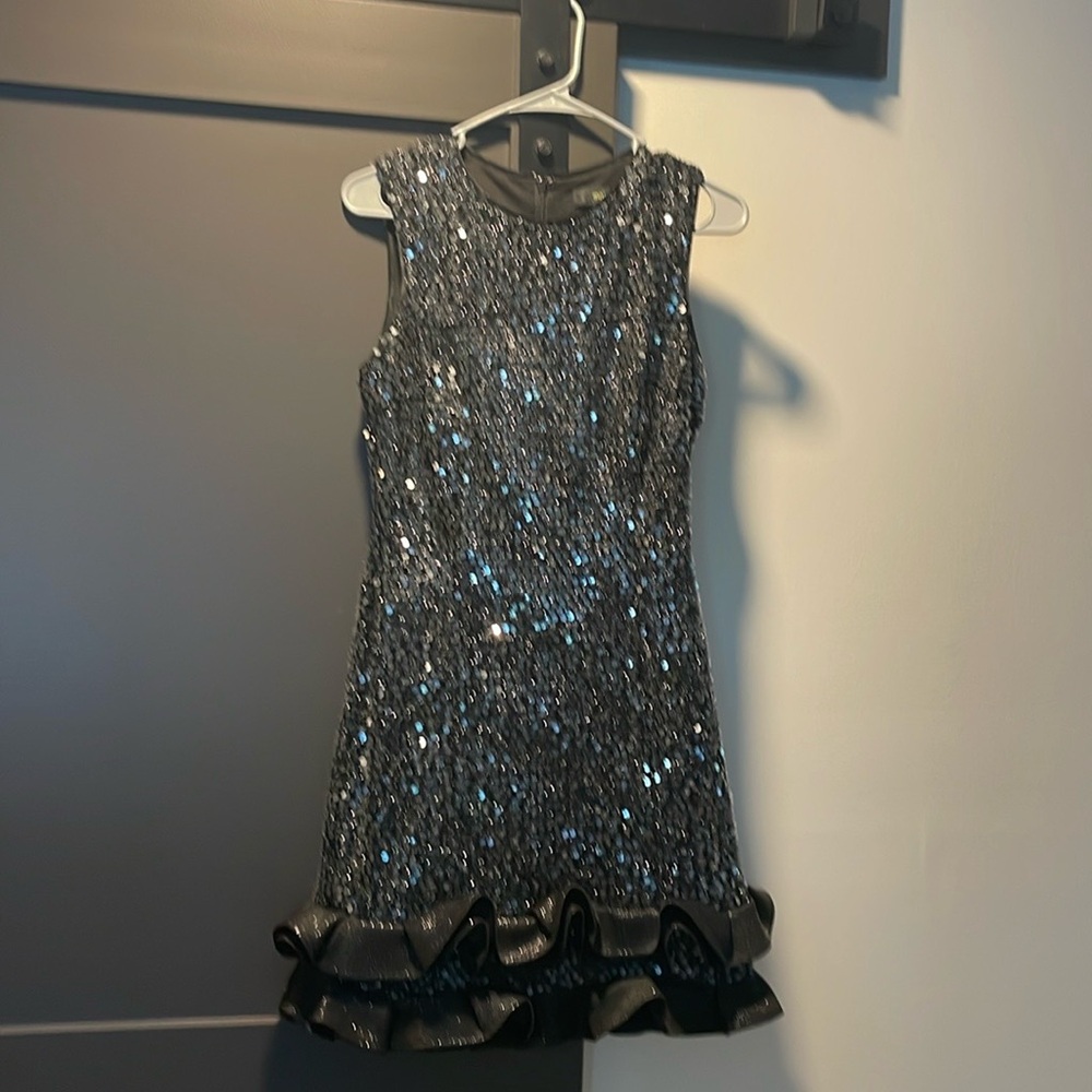 Sparkling Sleeveless Dress with Ruffle Hem